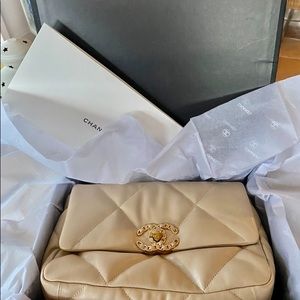 Used one time “C” 19 bag small beige in color.